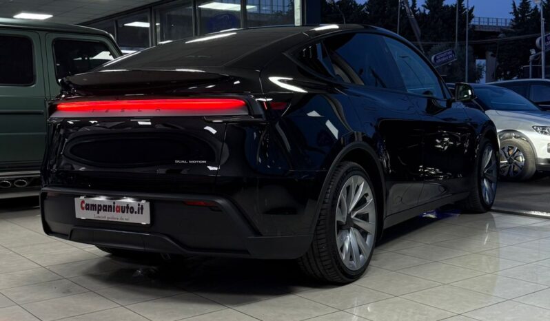 
								Tesla model Y completo									